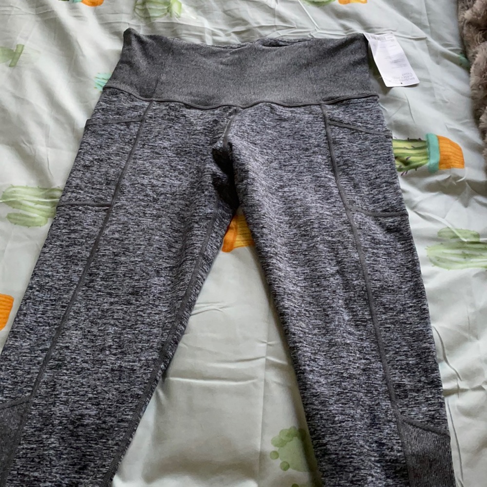 Athleta heel tight.